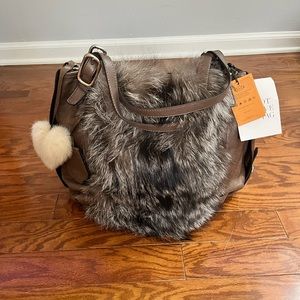 Medium sized hand bag or shoulder strap Tod’s fur/leather purse